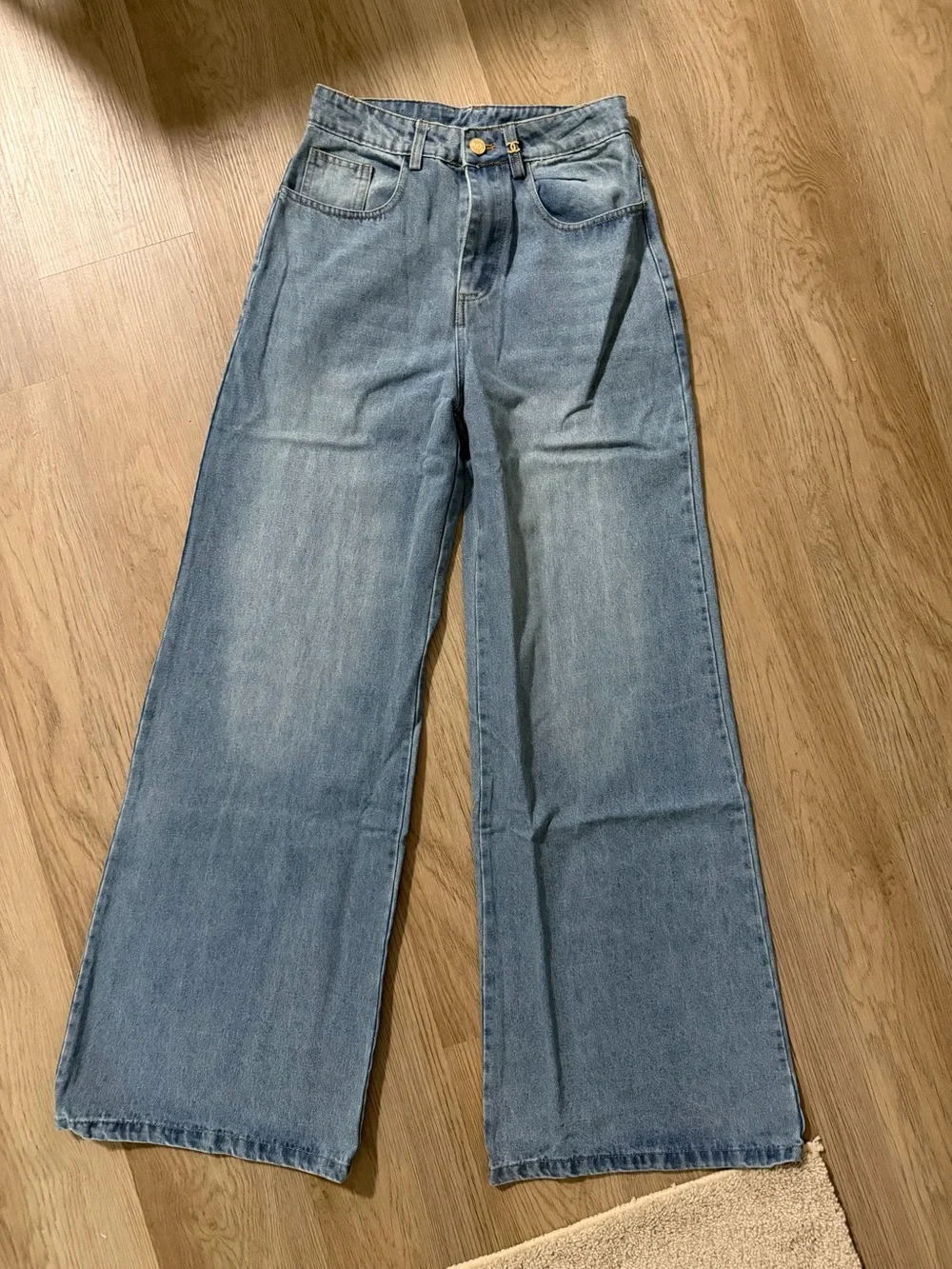 CHANEL Light Wash Wide-Leg Flared Jeans